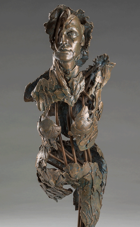 A haunting statue of a female form partly hollow