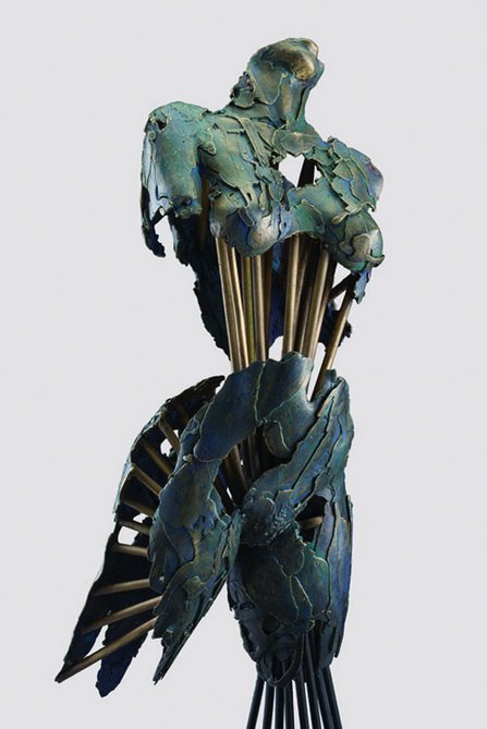 A haunting statue of a female form partly hollow