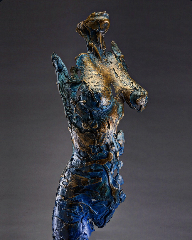 A haunting statue of a female form partly hollow